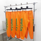 Orange Cotton Graphic Joggers - Men's