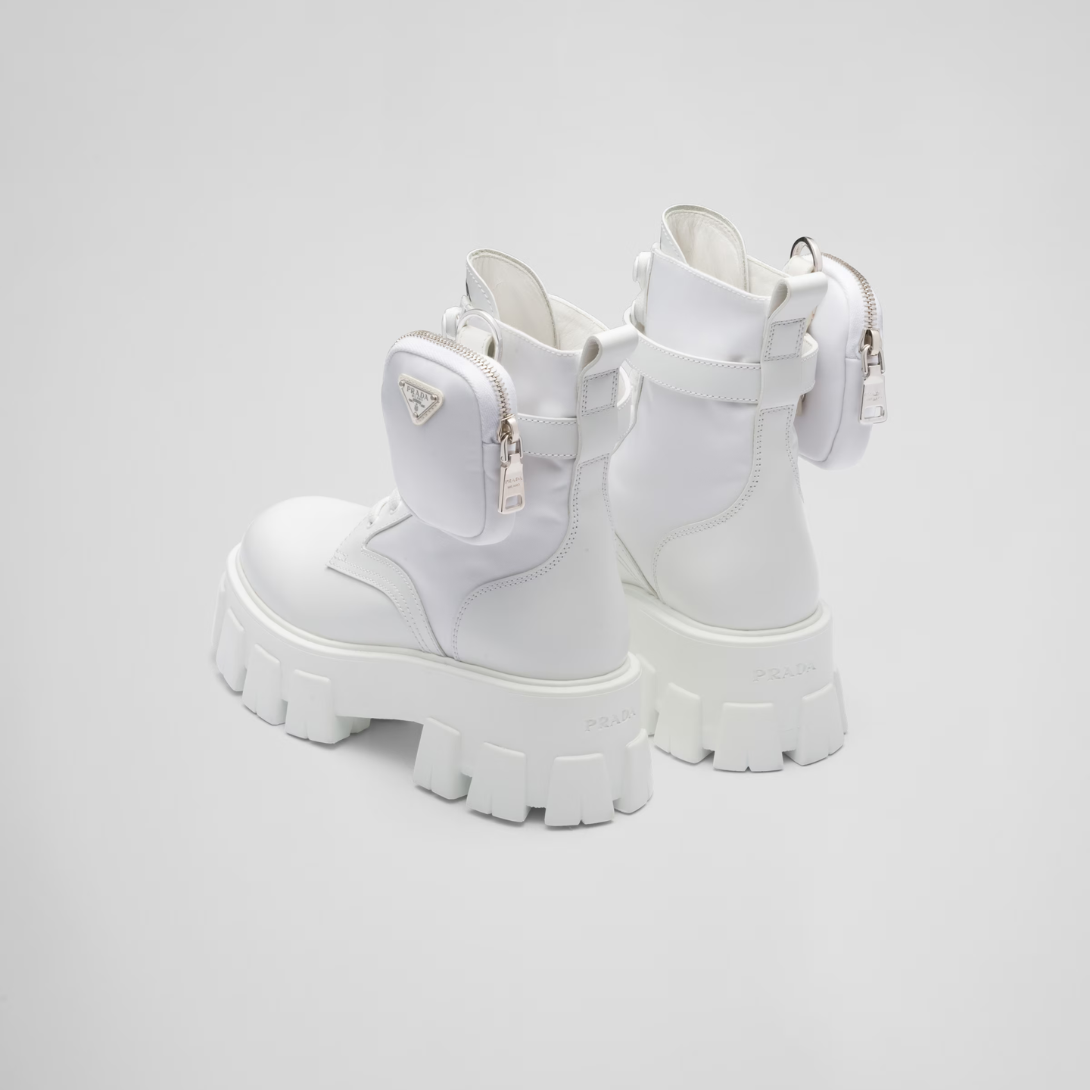 Monolith leather and Re-Nylon boots with pouch – made of leather and nylon, an industrial fabric traditionally tied to the brand, – LUX VERSE Luxury Designer Fashion Outlet