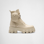 Monolith leather and Re-Nylon boots with pouch – a removable pouch featuring the iconic enameled metal triangle logo decorates – LUX VERSE Luxury Designer Fashion Outlet