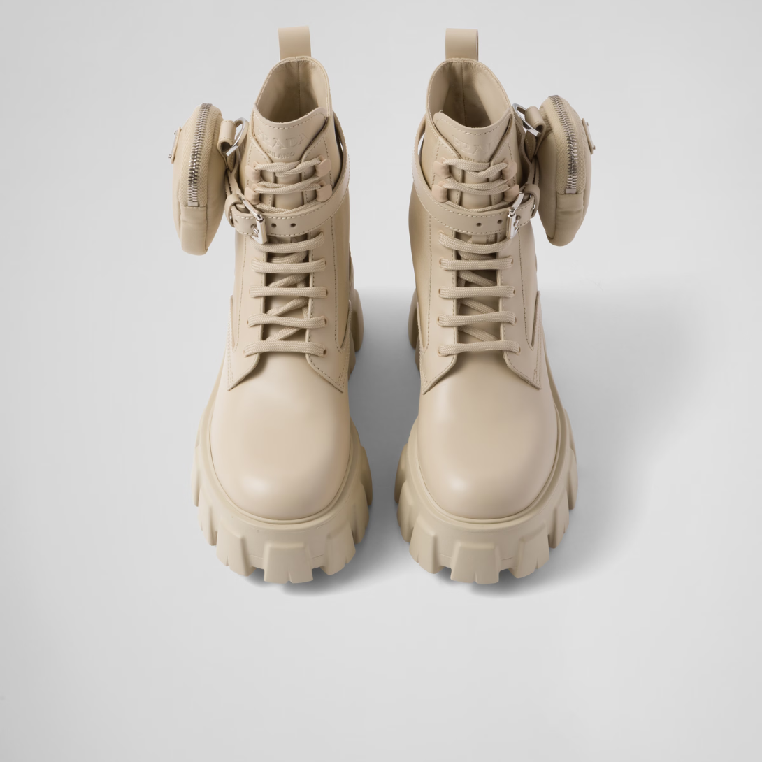 Monolith leather and Re-Nylon boots with pouch – made of leather and nylon, an industrial fabric traditionally tied to the brand, – LUX VERSE Luxury Designer Fashion Outlet