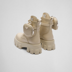 Monolith leather and Re-Nylon boots with pouch – a removable pouch featuring the iconic enameled metal triangle logo decorates – LUX VERSE Luxury Designer Fashion Outlet