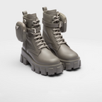 Monolith leather and Re-Nylon boots with pouch – made of leather and nylon, an industrial fabric traditionally tied to the brand, – LUX VERSE Luxury Designer Fashion Outlet