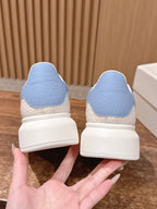 White and Blue Sneakers