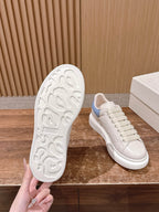 White and Blue Sneakers