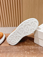 White and Brown Sneakers