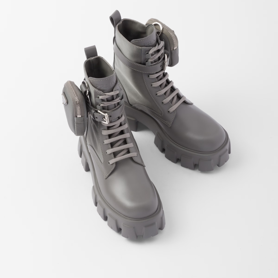 Monolith leather and Re-Nylon boots with pouch – a removable pouch featuring the iconic enameled metal triangle logo decorates – LUX VERSE Luxury Designer Fashion Outlet