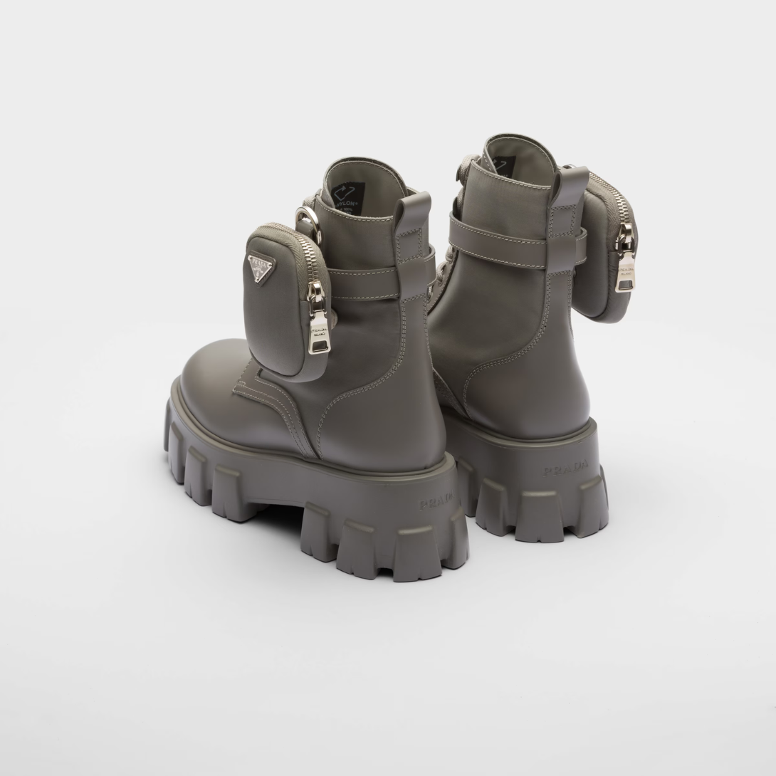 Monolith leather and Re-Nylon boots with pouch – made of leather and nylon, an industrial fabric traditionally tied to the brand, – LUX VERSE Luxury Designer Fashion Outlet