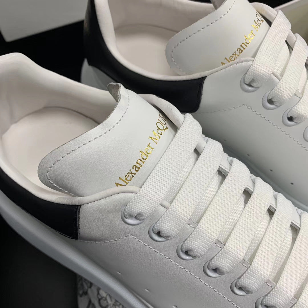 Oversized Black Leather Tab Sneakers
