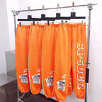 Orange Cotton Text Print Joggers - Men's
