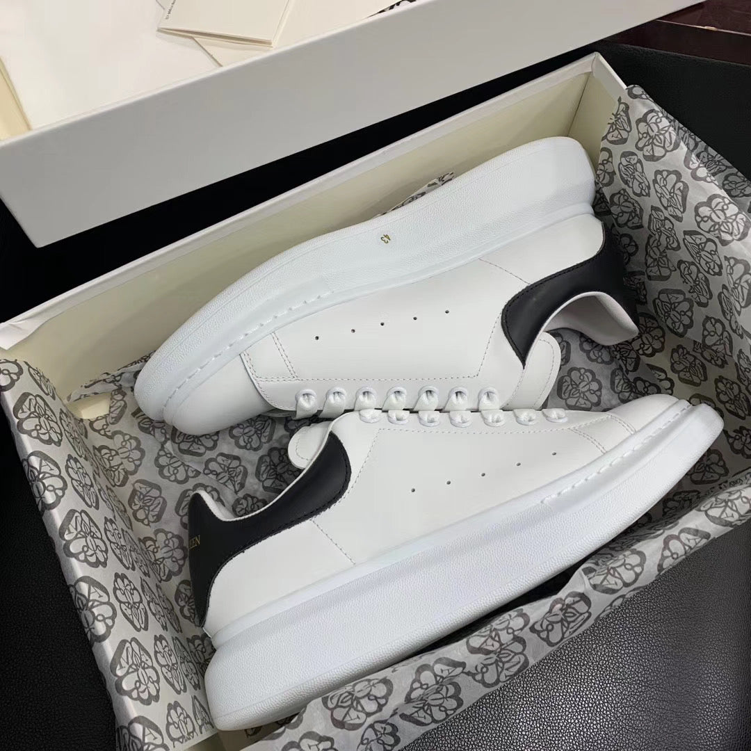 Oversized Black Leather Tab Sneakers
