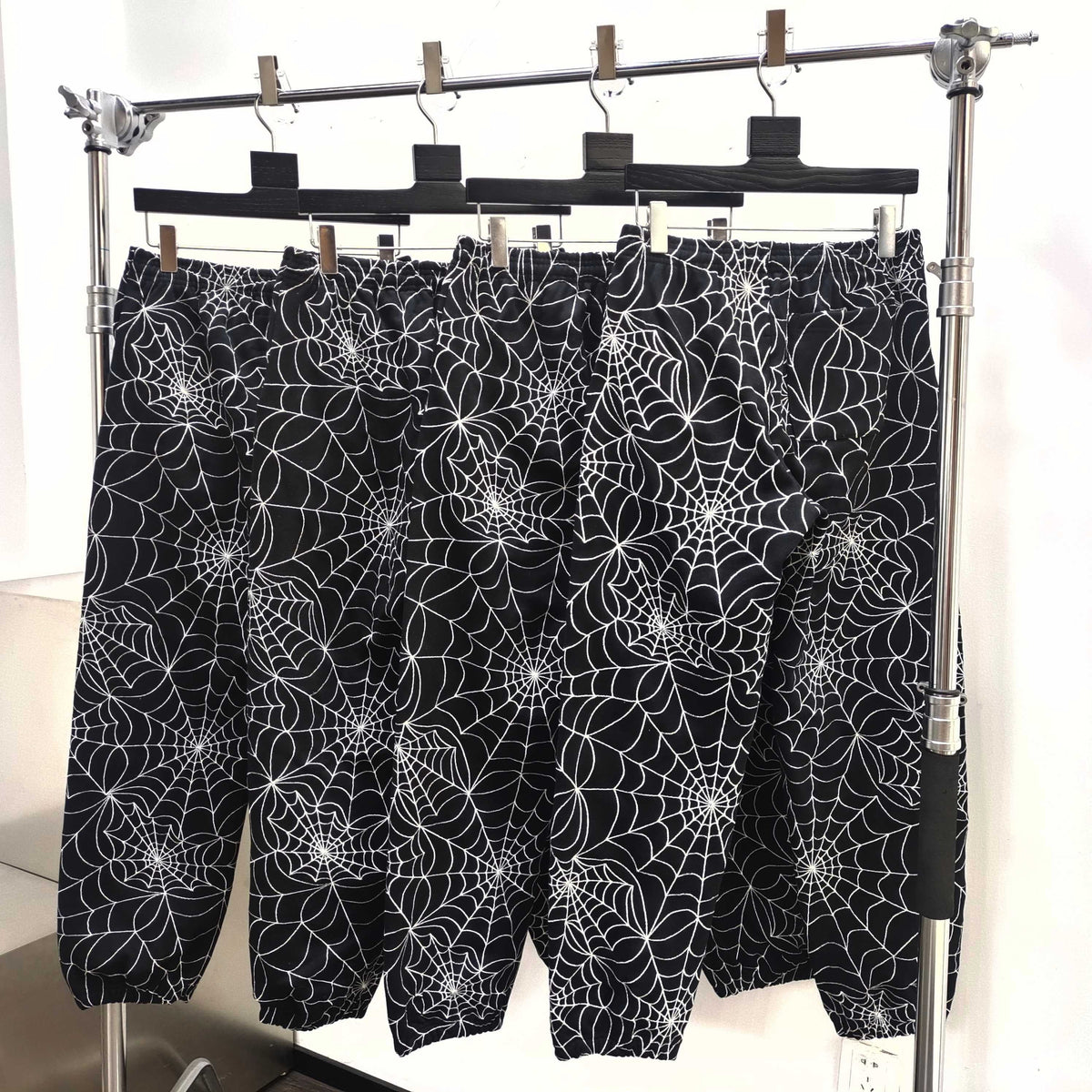 Black Cotton Web Print Joggers - Men's