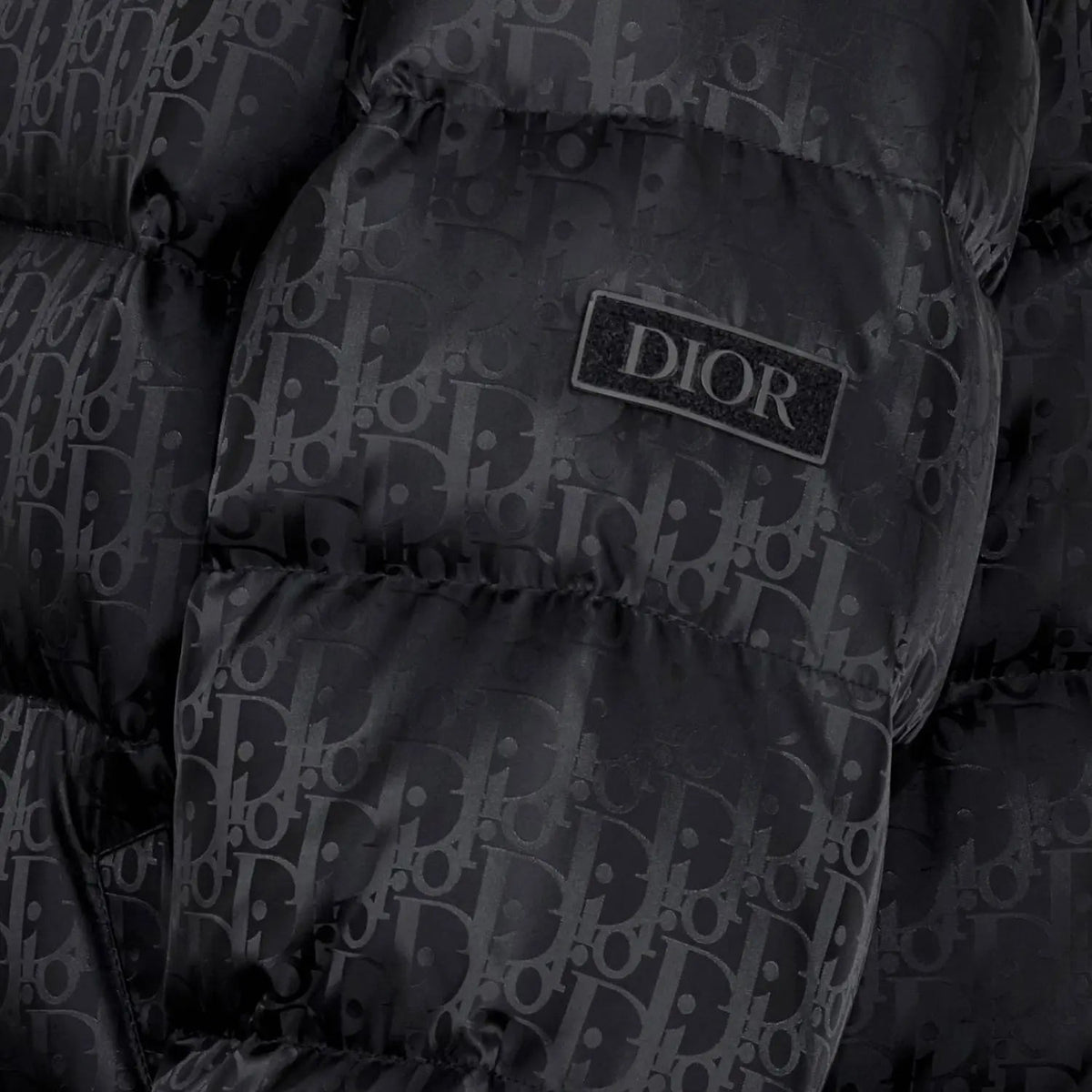 Oblique Down Jacket – both modern and relaxed, it features a two-way zip closure with double pulls, – LUX VERSE Luxury Designer Fashion Outlet
