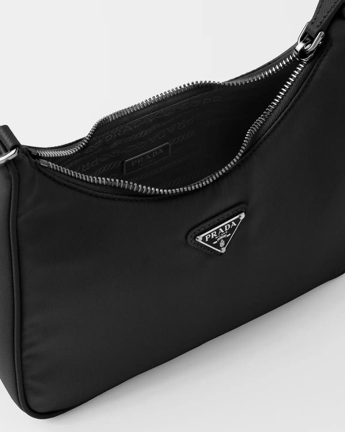 Re-Edition 2005 Re-Nylon bag – product code: 1BH204_R064_F0002_V_V9L Saffiano trim Removable chain handle – LUX VERSE Luxury Designer Fashion Outlet