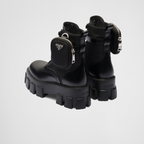 Monolith leather and Re-Nylon boots with pouch – made of leather and nylon, an industrial fabric traditionally tied to the brand, – LUX VERSE Luxury Designer Fashion Outlet