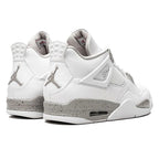 White Oreo – from there, a red Jumpman logo is embroidered on the tongue, adding a pop of color – LUX VERSE Luxury Designer Fashion Outlet