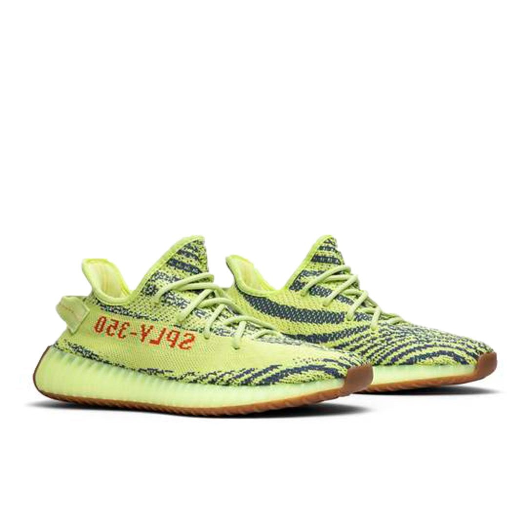 Semi Frozen – dressed in’ signature Primeknit upper, the lifestyle runner is finished in – LUX VERSE Luxury Designer Fashion Outlet