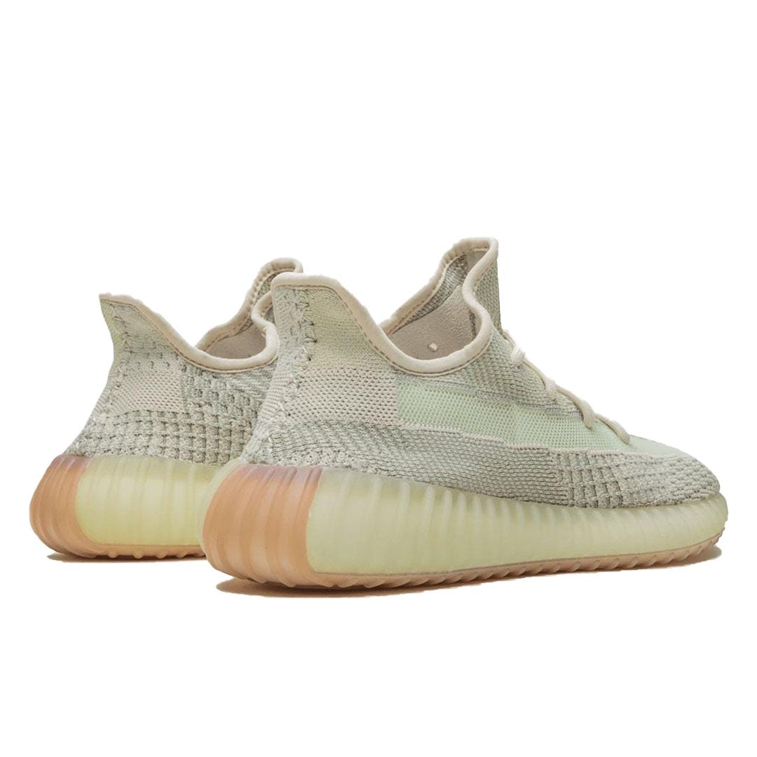Citrin – its distinctive TPU ribbed rubber sole, encasing Boost cushioning, is updated with a – LUX VERSE Luxury Designer Fashion Outlet