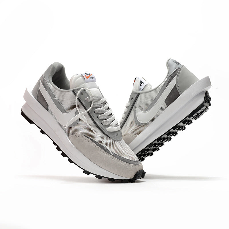 Sacai LDWaffle – this special-edition silhouette combines the LDV and Waffle Racer and features – LUX VERSE Luxury Designer Fashion Outlet