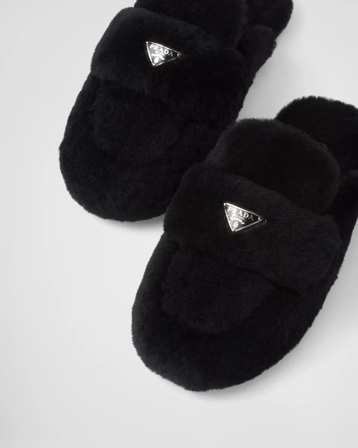 Shearling mules – the modern, minimalist silhouette creates a contrasting yet harmonious line – LUX VERSE Luxury Designer Fashion Outlet