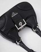 Moon Re-Nylon and leather bag – characterized by a harmonious and compact silhouette, this bag stands out for – LUX VERSE Luxury Designer Fashion Outlet
