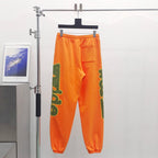 Orange Cotton Graphic Joggers - Men's