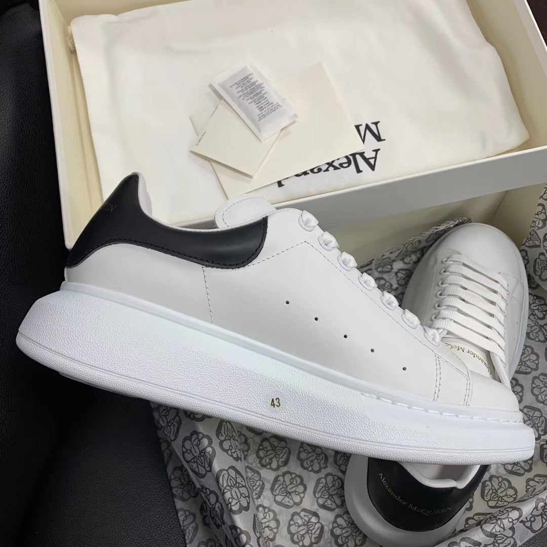 Oversized Black Leather Tab Sneakers