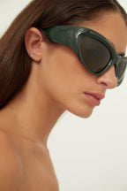 Bold wrap around green sunglasses – oval shape with wrap-around profiles in BIO Injection, sleek and ergonomic design – LUX VERSE Luxury Designer Fashion Outlet