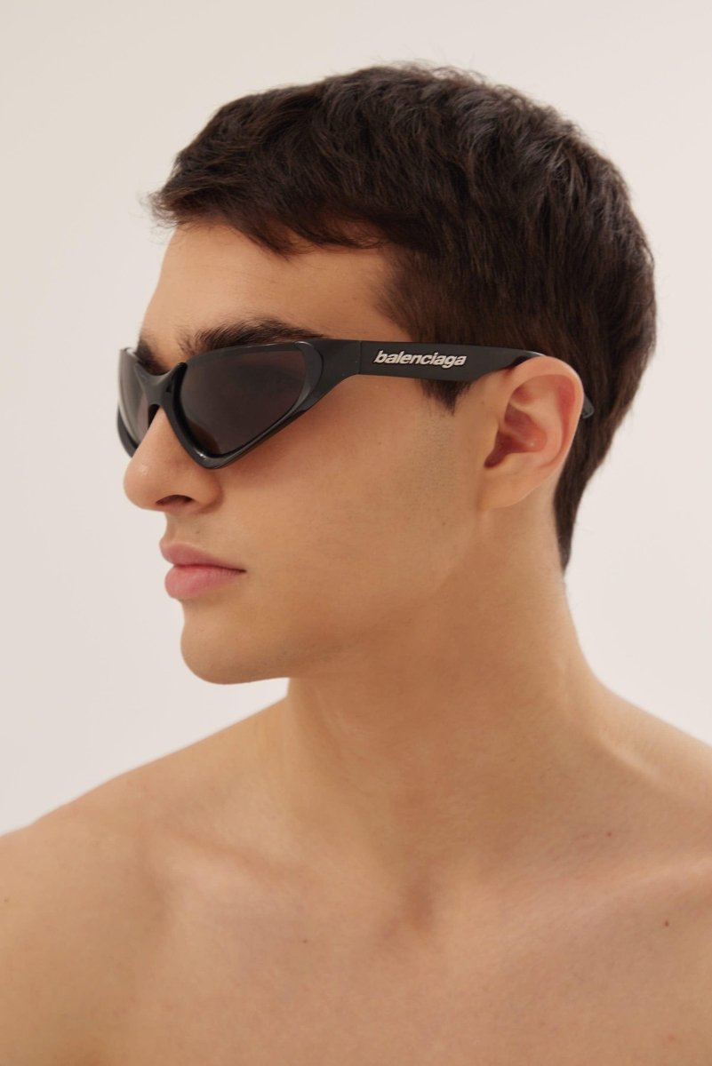 Xpander BB0202s-001 wrap around black sunglasses – lenses are set atop curved, bio injected frames, as opposed to inside or behind them – LUX VERSE Luxury Designer Fashion Outlet