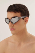 Xpander silver BB0202s-002 wrap around sunglasses – high relief metallic logo is prominently stamped on the middle of – LUX VERSE Luxury Designer Fashion Outlet