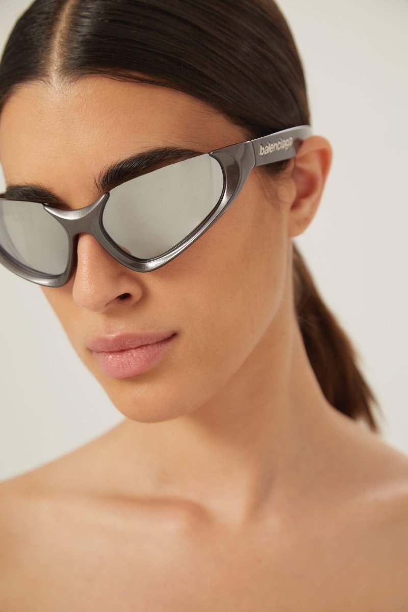 Xpander silver BB0202s-002 wrap around sunglasses – high relief metallic logo is prominently stamped on the middle of – LUX VERSE Luxury Designer Fashion Outlet