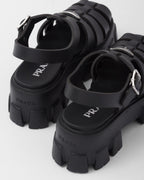 Foam rubber sandals – upper with metal buckle Enameled metal triangle logo Rubber sole: 55 mm Fabric pouch – LUX VERSE Luxury Designer Fashion Outlet