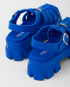 Foam rubber sandals – upper with metal buckle Enameled metal triangle logo Rubber sole: 55 mm Fabric pouch – LUX VERSE Luxury Designer Fashion Outlet