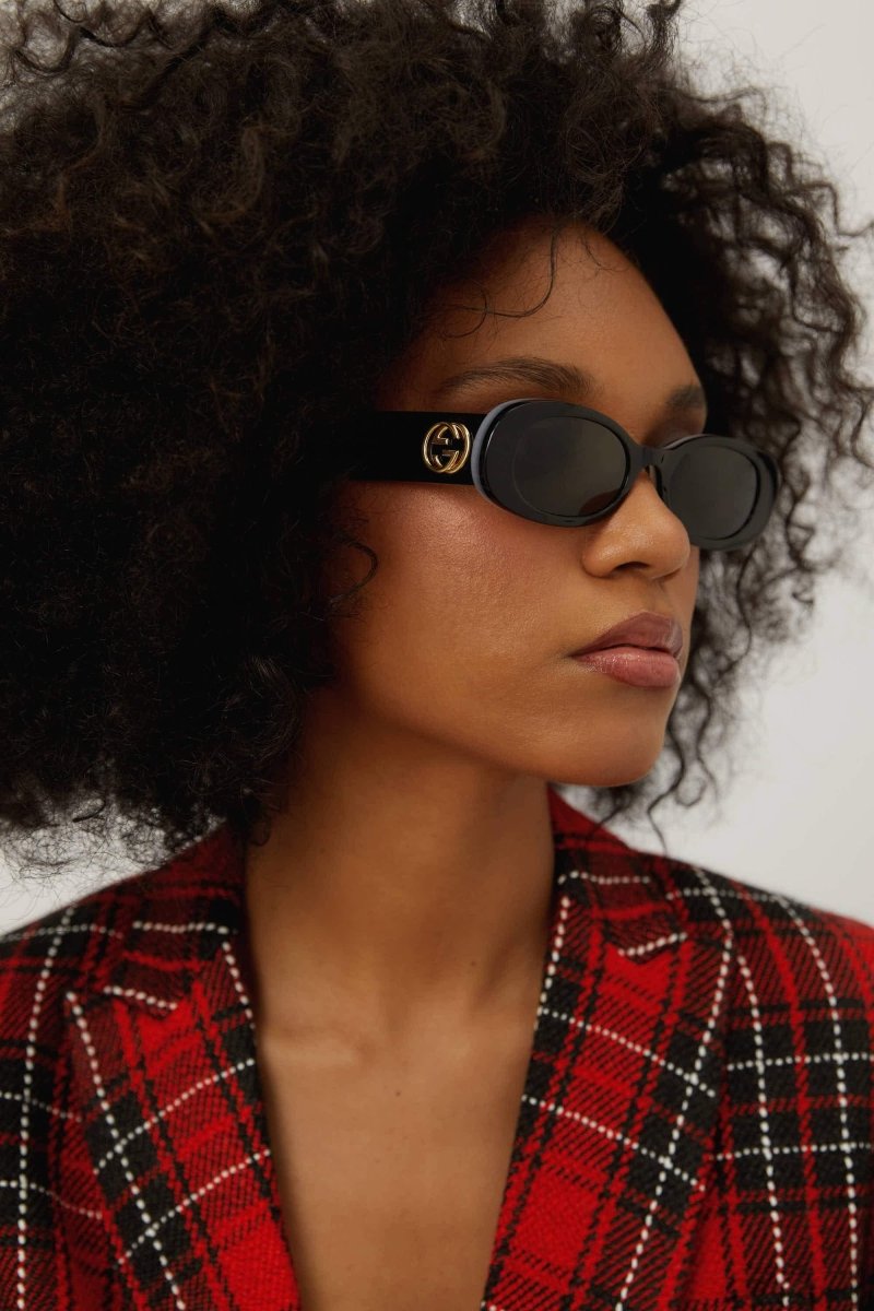 Black oval sunglasses – the temple tips end with a perforeted end tip – LUX VERSE Luxury Designer Fashion Outlet