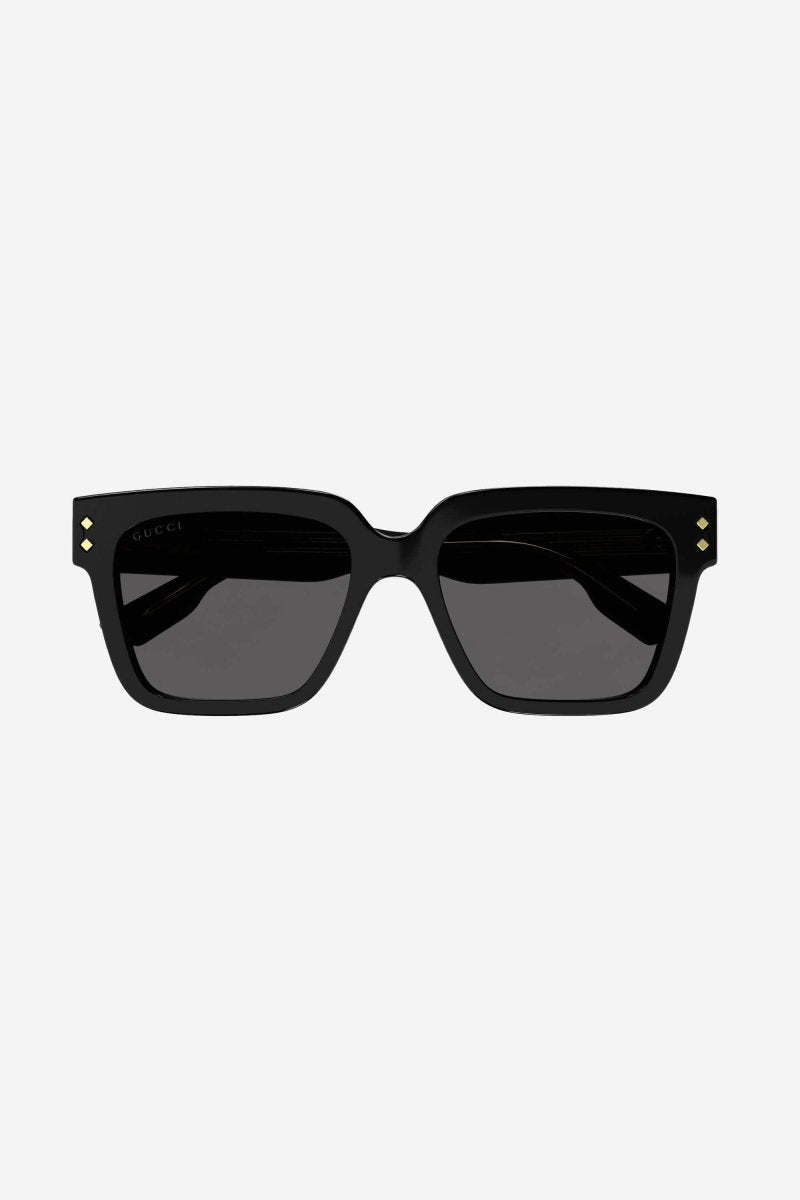Bold squared black sunglasses – there’s a golden light; Marcello, an aspiring novelist is taking a stroll and out – LUX VERSE Luxury Designer Fashion Outlet