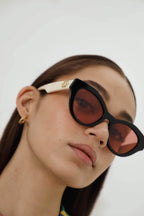 Cat eye black and cream sunglasses – inspired by a gender fluid look, translated in a street style effortless look – LUX VERSE Luxury Designer Fashion Outlet