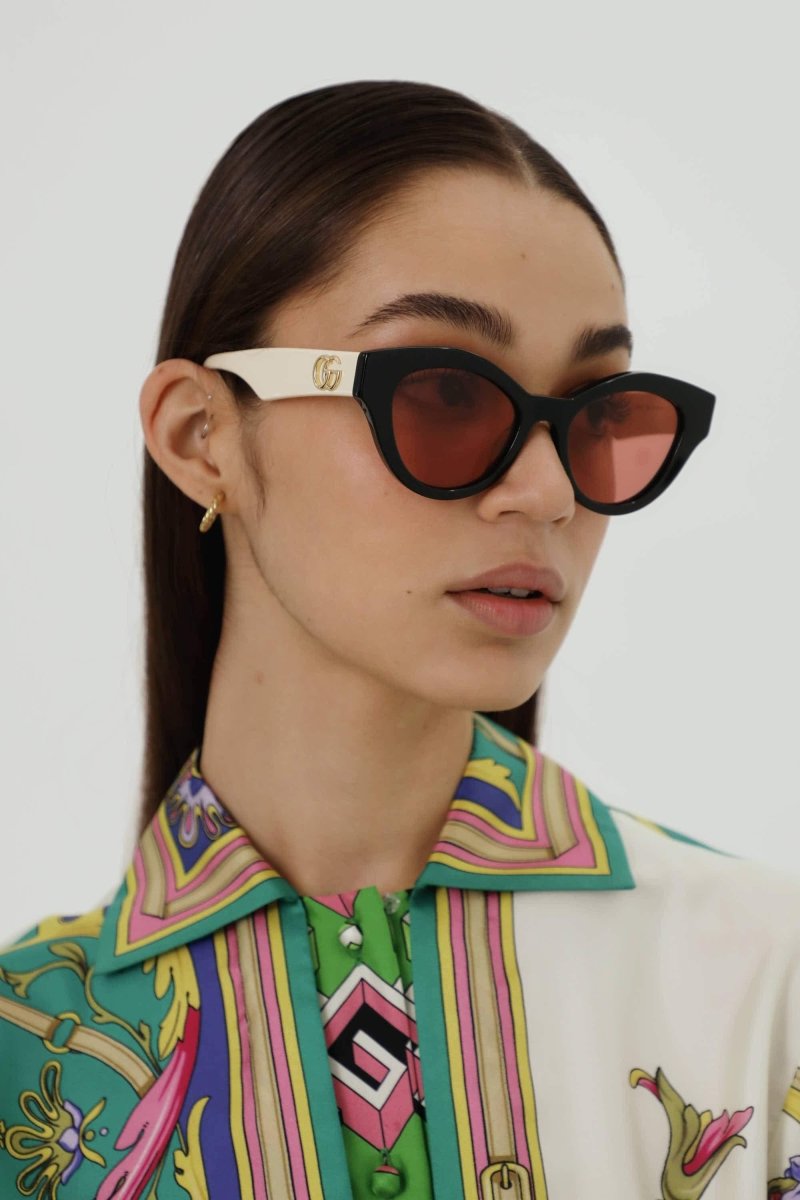 Cat eye black and cream sunglasses – cat-eye shape in plastic conceived for an extra-feminine look – LUX VERSE Luxury Designer Fashion Outlet