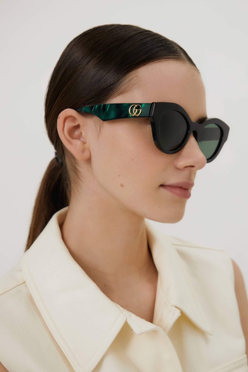 Cat eye black and green sunglasses – pared-back simplicity characterizes the essential shapes, lines and colours of this – LUX VERSE Luxury Designer Fashion Outlet