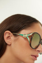 Fork acetate green sunglasses – acetate front paired with metal temples with the iconic fork hinge and the GG – LUX VERSE Luxury Designer Fashion Outlet
