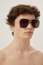 Gold metal squared sunglasses – you’re at the cinema, all comfy on the plush sea-blue velvet seats and your – LUX VERSE Luxury Designer Fashion Outlet