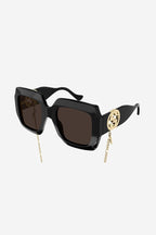 Oversized femenine black sunglasses with integrated GG logo – a new interpretation of Chain iconic concept to see with new eyes: – LUX VERSE Luxury Designer Fashion Outlet