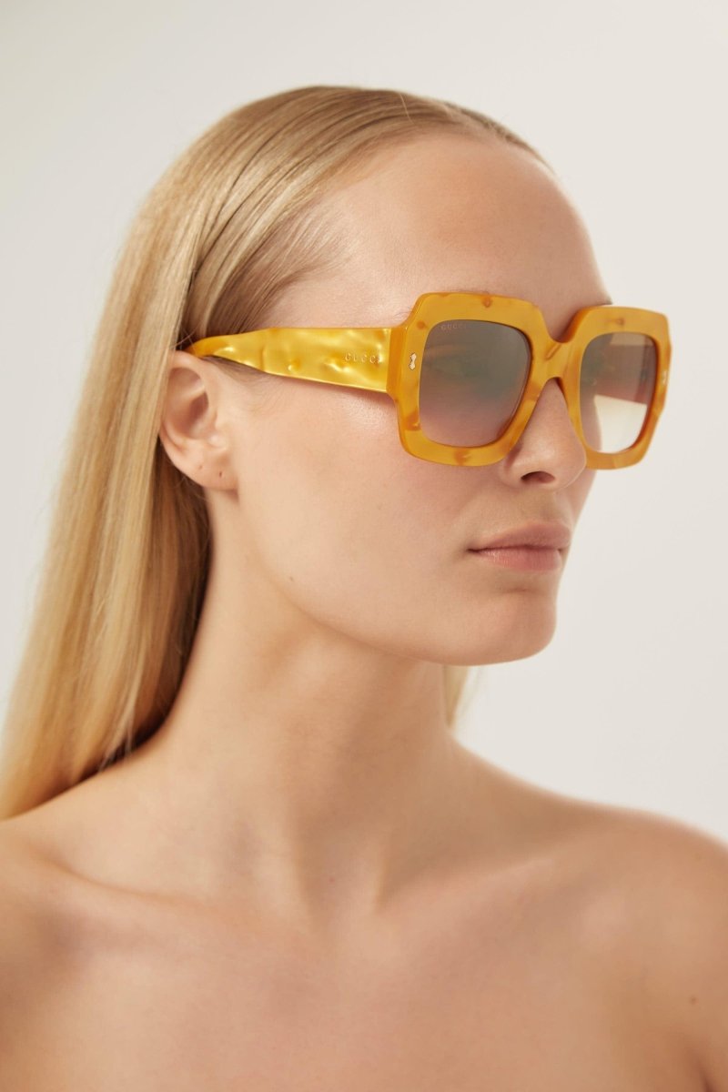 Oversized squared sustainable yellow sunglasses – the frames contain up to 68% bio-based acetate and are enriched with mineral glass – LUX VERSE Luxury Designer Fashion Outlet