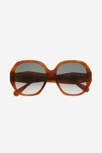 Round light havana sunglasses – modern concept characterized by subtle decorations and geometry – LUX VERSE Luxury Designer Fashion Outlet