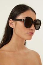 Round oversized black sunglasses – this oversize geometrical style has an enamel detail that emphasizes the shape, – LUX VERSE Luxury Designer Fashion Outlet
