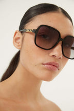Vintage look squared sunglasses – gold letters."This pilot shape is easy-to-wear, in full acetate – LUX VERSE Luxury Designer Fashion Outlet