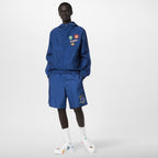 LV x YK Monogram Faces Swimshorts – the deep blue technical fabric with an allover Monogram jacquard is embellished on – LUX VERSE Luxury Designer Fashion Outlet