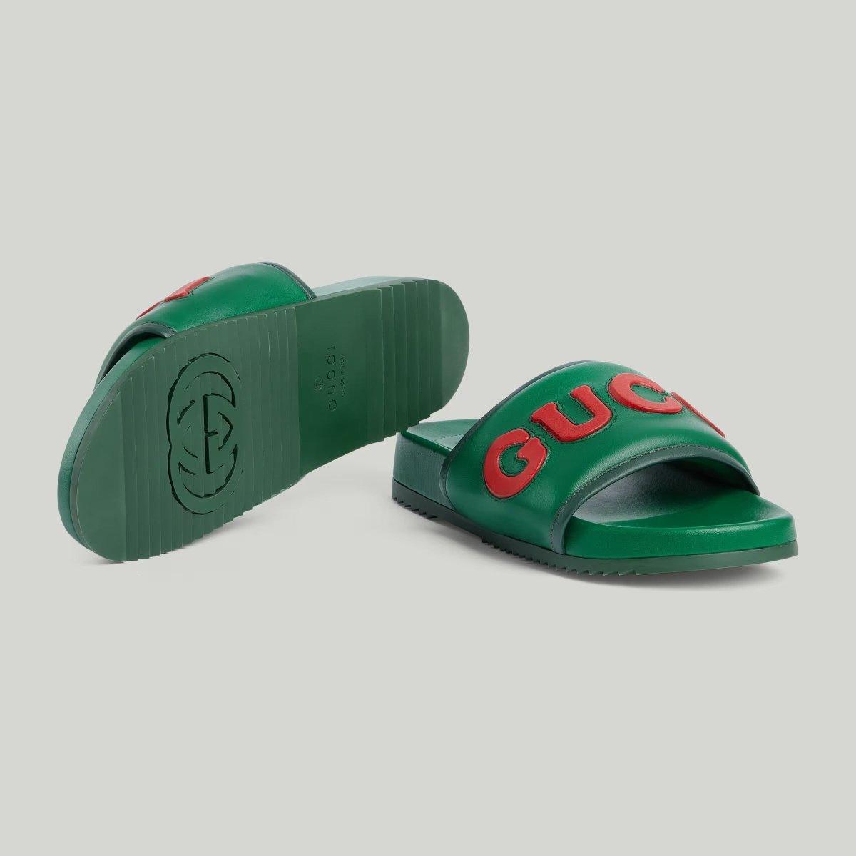 Men's slide sandal – this pair of men's slide sandal is crafted in black leather and defined by – LUX VERSE Luxury Designer Fashion Outlet