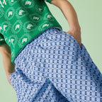 Nylon printed swim shorts – a mix of colors and textures overlap to form new, unconventional designs – LUX VERSE Luxury Designer Fashion Outlet