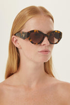 Oval sunglasses featuring iconic logo – sunglasses for women include a wide range of silhouettes and colors – LUX VERSE Luxury Designer Fashion Outlet