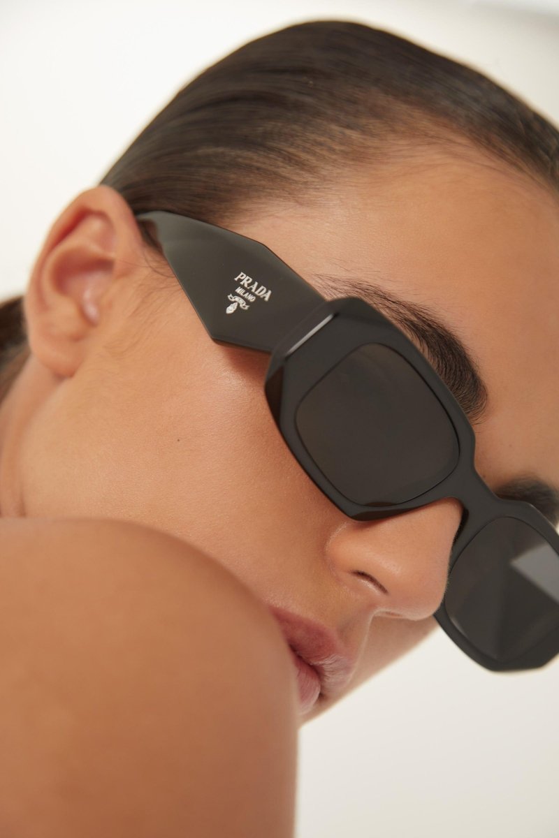 PR17WS symbol black oval sunglasses – of silhouettes and colors: from the refined CinŽma styles to square – LUX VERSE Luxury Designer Fashion Outlet