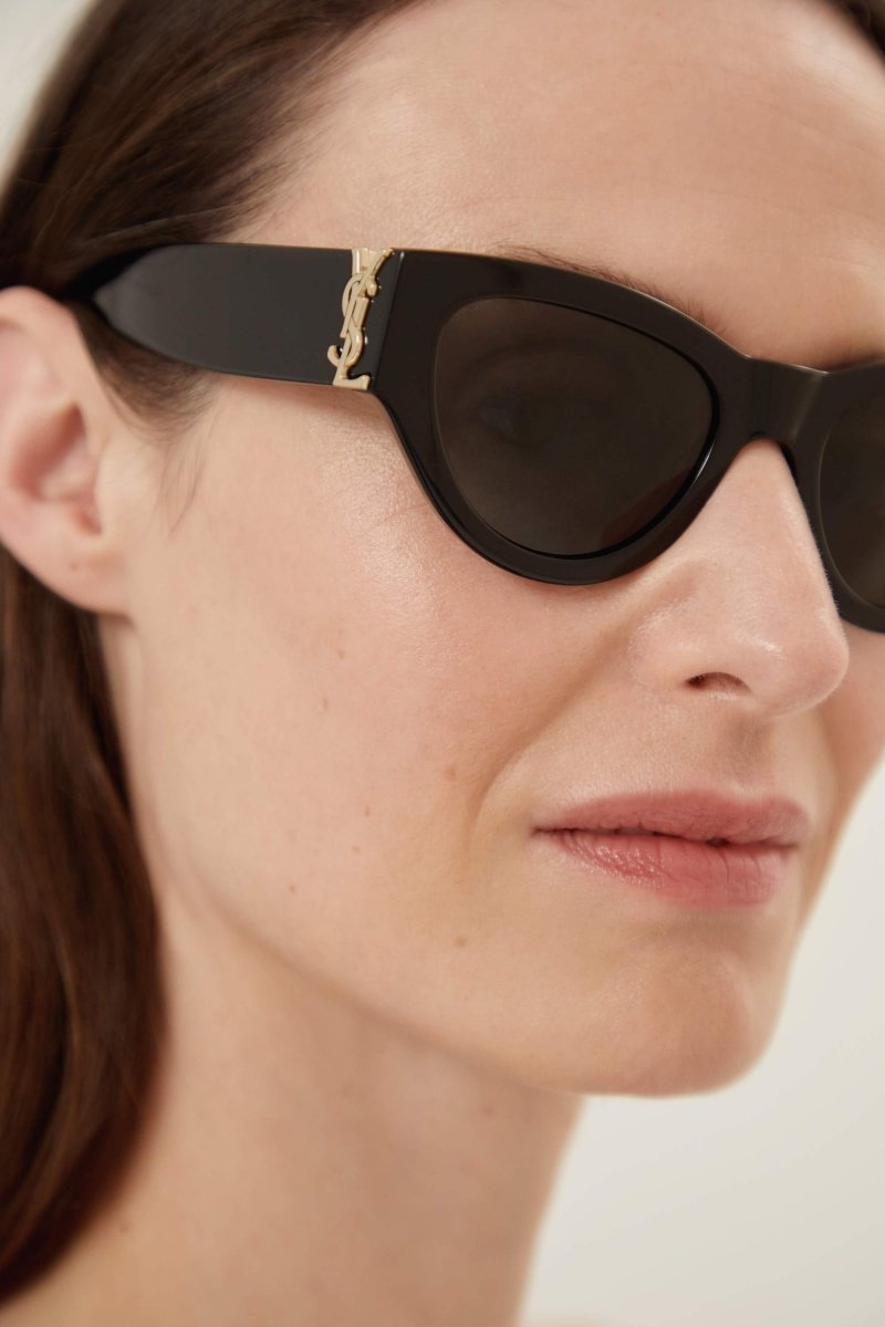 Black almond shape featuring bold YSL logo – a STRONG FEMININE CAT-EYE SHAPE, THE EVOLUTION OF THE MONOGRAM ACETATE IN A BOLDER – LUX VERSE Luxury Designer Fashion Outlet